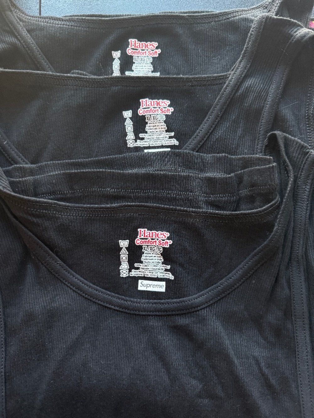 3 x supreme singlets